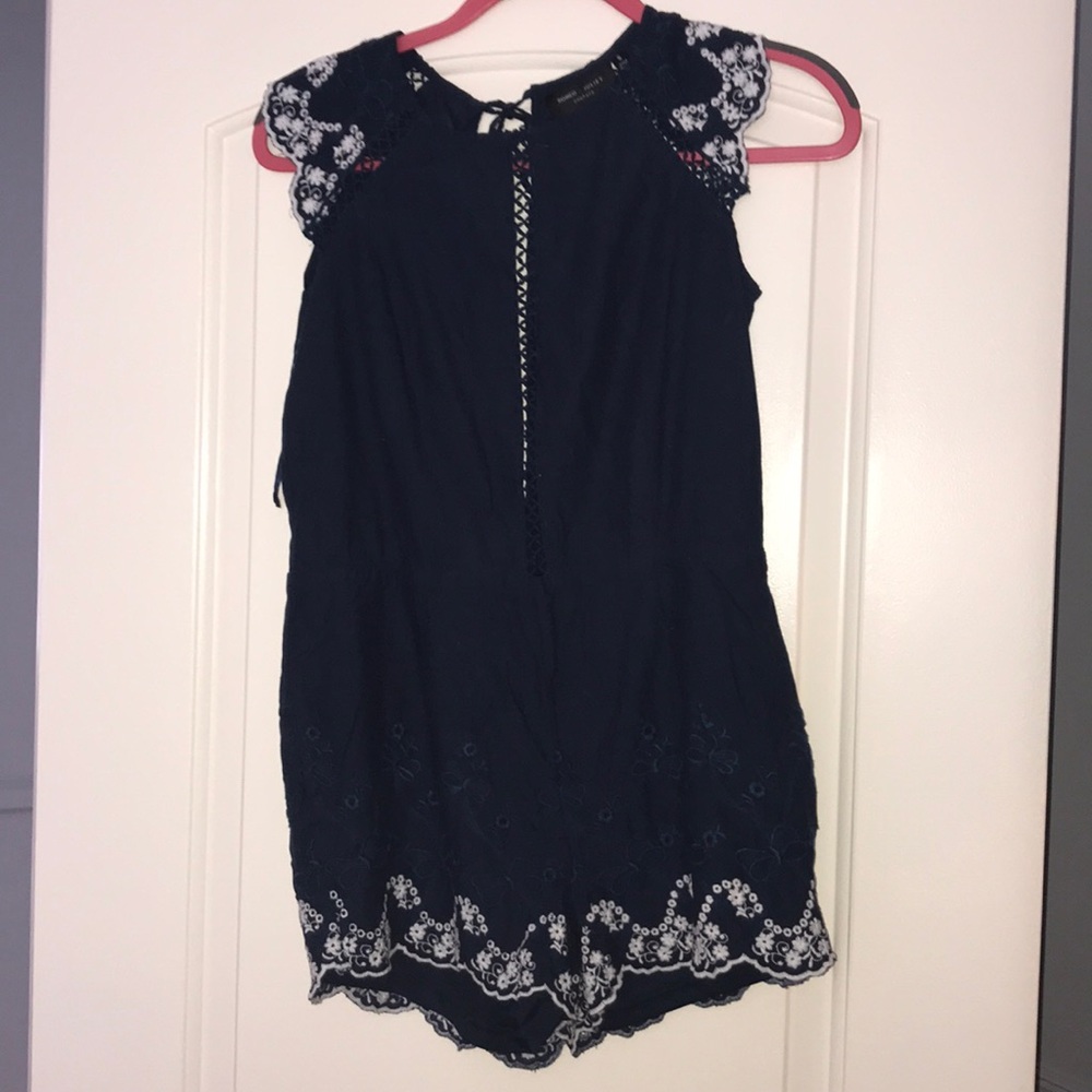 A blue and white romper